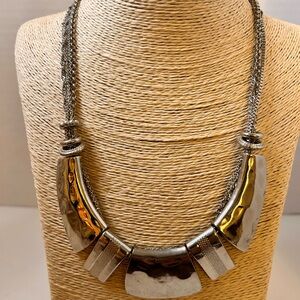 Silver tone necklace hammered bib style approx 10” chunky scriptural design